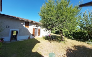 Rear garden, fully fenced and secure with garden furniture. Direct access.