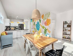 Dining room area with seating for 9 guests.