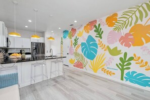 Bright + open layout! Several fun murals can be found throughout the house!