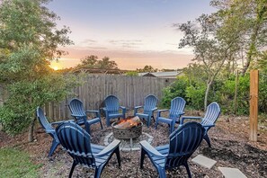 Enjoy our firepit area with seating for 8 people. 