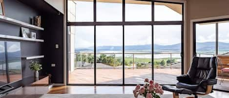 Enjoy panoramic views over the Tamar River from the main living area.