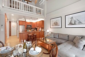 From breakfast nooks to vaulted beams, every inch of this stylish living area is made for laughter, lounging, and leisure PKC-403