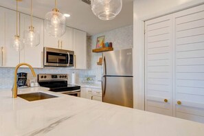 Fully stocked and newly renovated kitchen makes meal prep easy