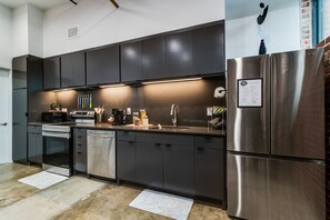 Fully stocked kitchen with everything you need to cook while during your stay. 