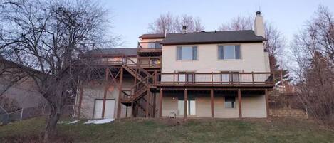 Back of our Quad-level home.  Three total decks! Rooms are spread out - PRIVACY!