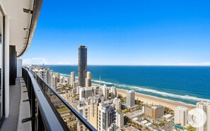 Balcony features glittering ocean and city views