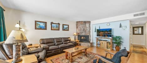 Seating for the whole family in this cabin-feel condo