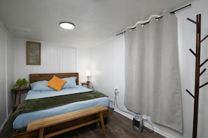 The third bedroom is in the basement den area for privacy.