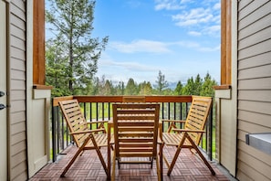 Private balcony with outdoor seating and a BBQ.