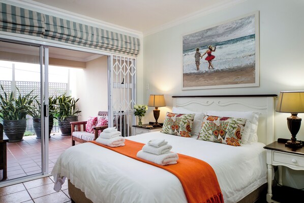 Main bedroom, garden and side ocean view.