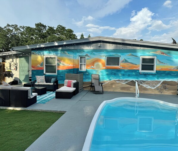 Enjoy the feeling of being on the beach, in your private pool and yard.