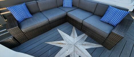 Hot Tub & Outdoor sectional on deck featuring built in Cypress Nautical Stars