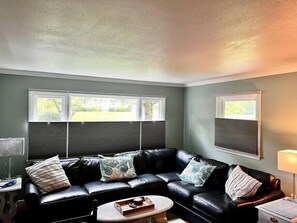 Super comfortable Brand New leather sectional sofa for relaxing with friends or enjoying the game on our SmartTV. 