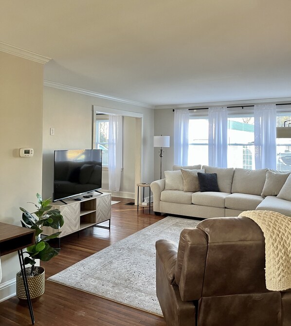 Spacious living room with smart TV