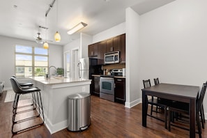 Full kitchen and dining area.