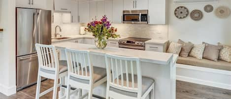 Kitchen with island and bench seat