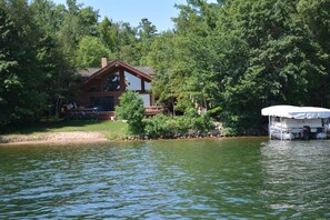 view from the lake to the house