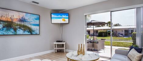 Sliding door to the open patio.  Smart TV with cable channels and WiFi