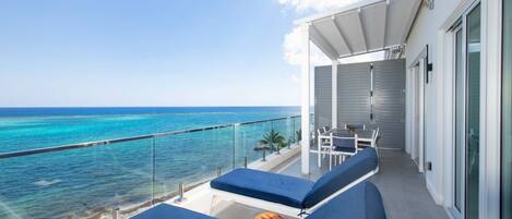 Relax and soak up the sun on this spacious balcony.