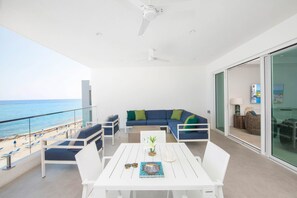 Balcony with table for four.