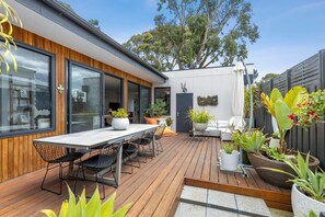 Bathe in the sunshine on the private east deck, with ourdoor dining and BBQ facilities