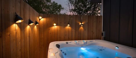 night time + hot tub.