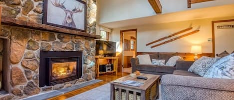 Rest and relax by the stone gas fireplace and watch a movie or catch a game. 