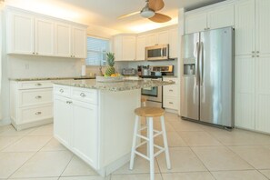 Prepare your favorite meals in this open concept kitchen with all stainless steel appliances.