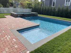 pool with raised heated Spa