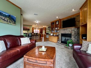 Main floor living room with fireplace. 