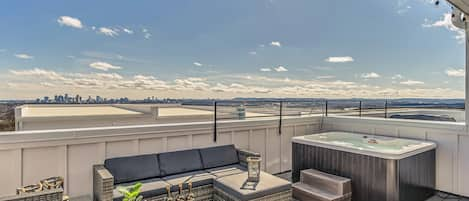 Spacious rooftop with Nashville's skyline in the distance PLUS hot tub.