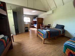 Optional setup of 6 Twins or 4 twins and a king bed