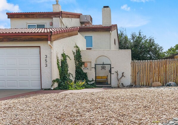 Fairway Desert Vista-Valley Views Next to Golf - a SkyRun Grand Junction Property - Front view of home from street