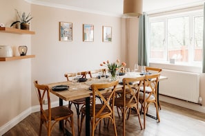 Large dining table to easily accommodate 8 guests