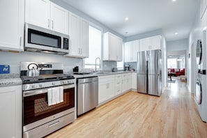 Spacious kitchen ready to create your culinary delights