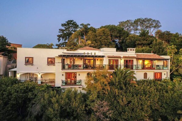 Exterior of home featuring 7 balconies