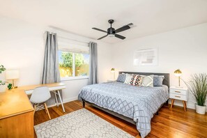 Master bedroom offers a king bed with fresh linens and towels provided.