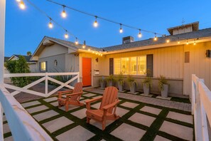 Enjoy the hanging lights in the outdoor seating area.