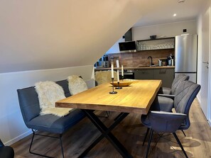 Dining table with comfortable leather bench