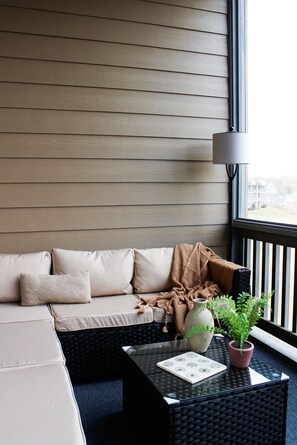 Screened in porch with lake and marina view