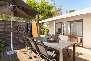 Outdoor decking & entertainment area.   Guest review: "We had a wonderful stay"