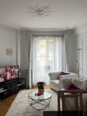 Dining room table to fit 4, a perfect space for a family gathering.