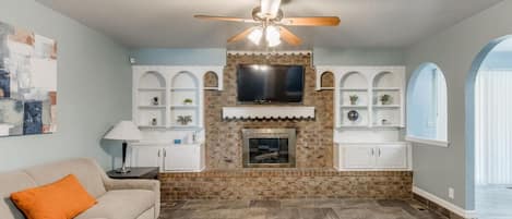 Kick back and relax in the cozy comfort of this inviting living room.