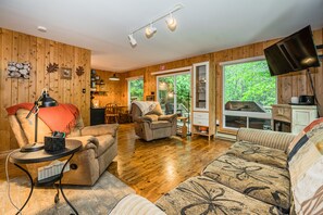 An incredibly cozy and rustic living area perfect to enjoy quality time with friends and family. 