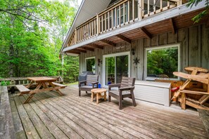 Plenty of seating on the back deck for guests.