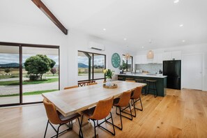 Come together around the large dining table or take things slow up at the breakfast bar.
