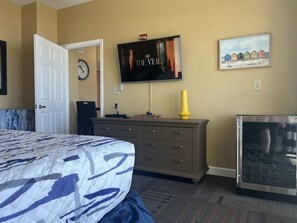 Master bedroom with wine cooler and TV