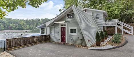 The front door which leads into the mudroom, kitchen, and living space.