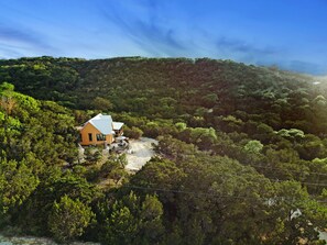 1500 sq tucked up high in our hills. Privacy, excellence/ views for MILES!
