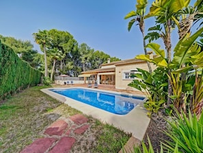 Water, Plant, Property, Sky, Swimming Pool, Building, Azure, Tree, Natural Landscape, Grass